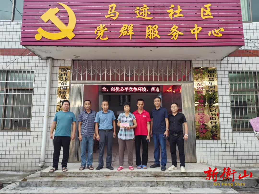 暴雨无情人有情 商会慰问暖人心